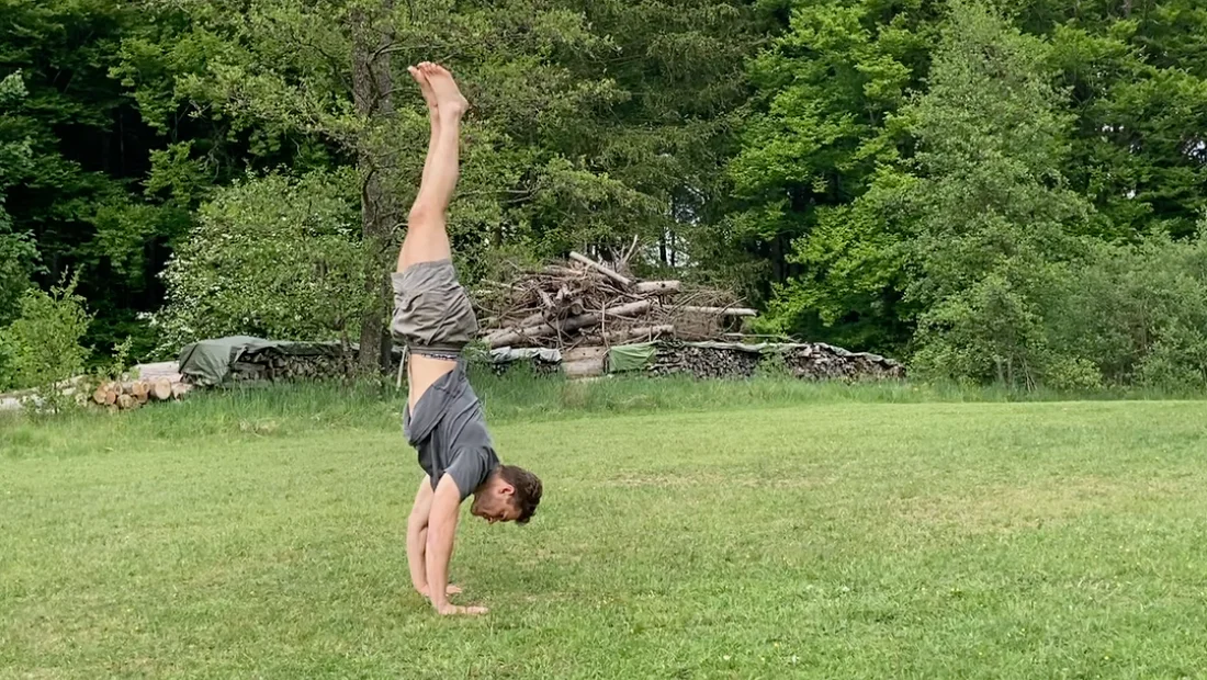 Nils doing a handstand outside